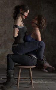 resident-evil-hentai-–-rindekey,-claire-redfield,-bound,-sitting-on-lap,-gagged,-bound-ankles